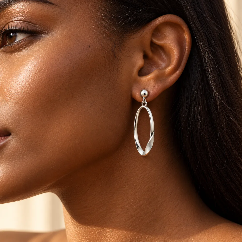 Poise earrings worn